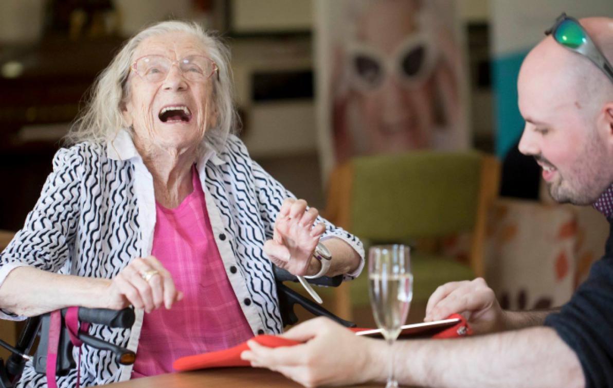 Image of a woman laughing