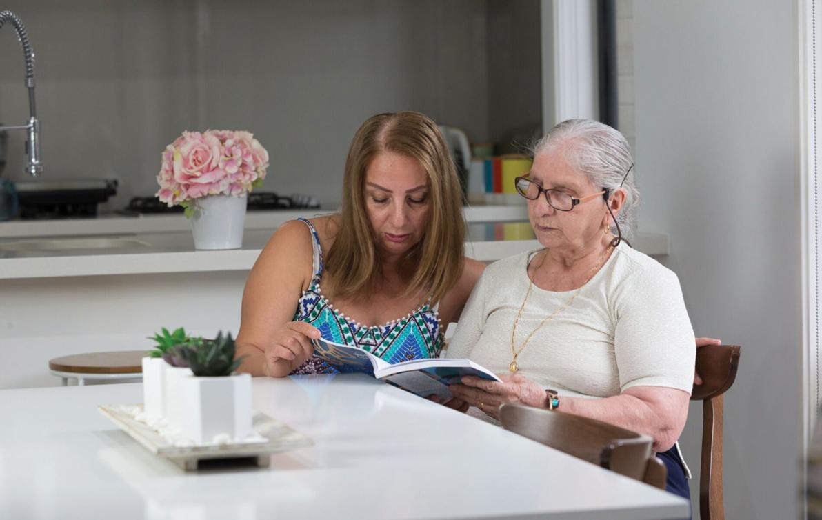 Elderly lady spending time with daughter