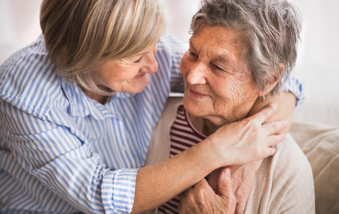 A daughter and mother embracing